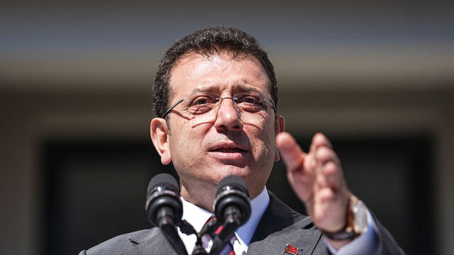 E K R E M İ M A M O G L U A Ç I K L A M A