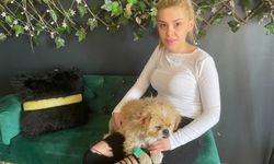 Kadının iple ayaklarını bağladığı köpeği çöpe attılar