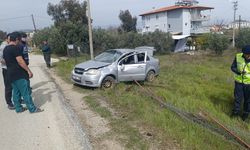 Takla atan otomobilden dışarı fırladı