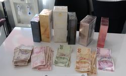 Topladığı paraları bebek arabasına saklamış