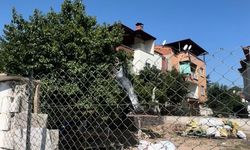 Tellere takılan güvercin imdadına muhtar yetişti