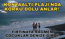 Konyaaltı Plajı'nda korku dolu anlar! Fırtınaya rağmen çocuklar denize girdi!