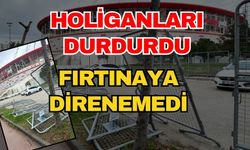 Holiganları durdurdu, fırtınaya direnemedi