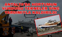 Antalya’da hortumun vurduğu tekneler vinç yardımıyla kaldırıldı