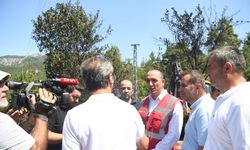 Konyaaltı Belediyesi Başkanı Cem Kotan yangın yerini inceleme aldı