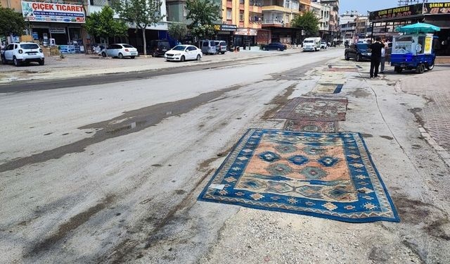 Belediyenin yapmadığı yola esnaftan ilginç çözüm